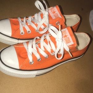 Orange converse shoes